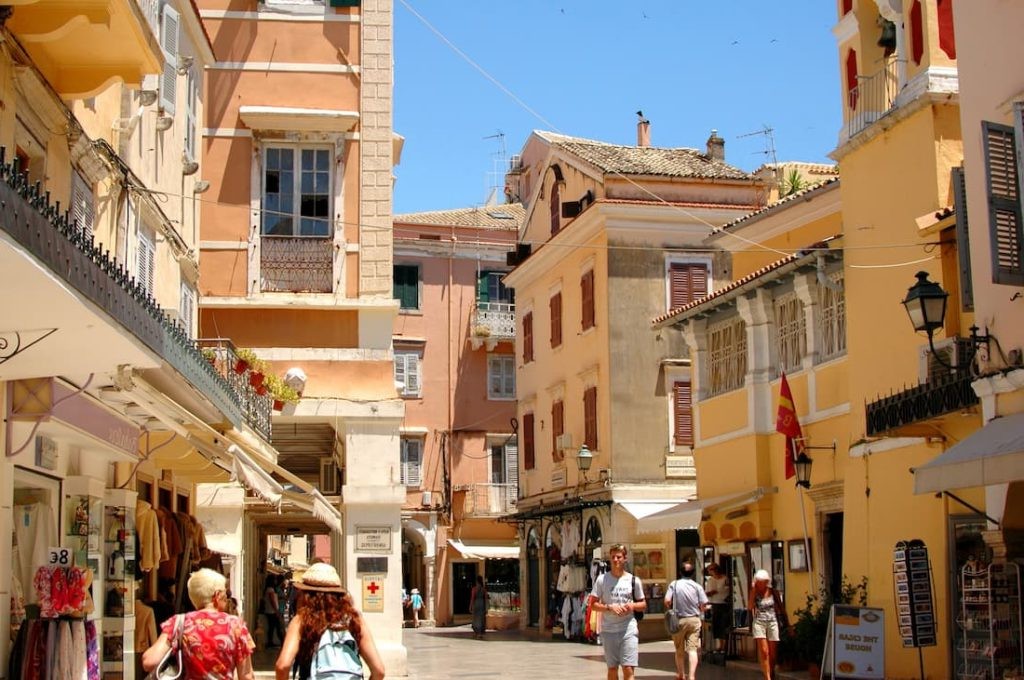Historic street scene in Corfu Town with people strolling
