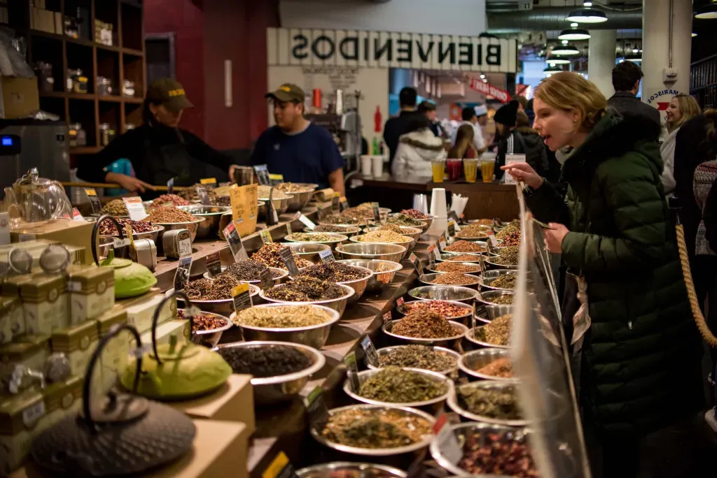 A colorful wall of spices on display at Chelsea Market.