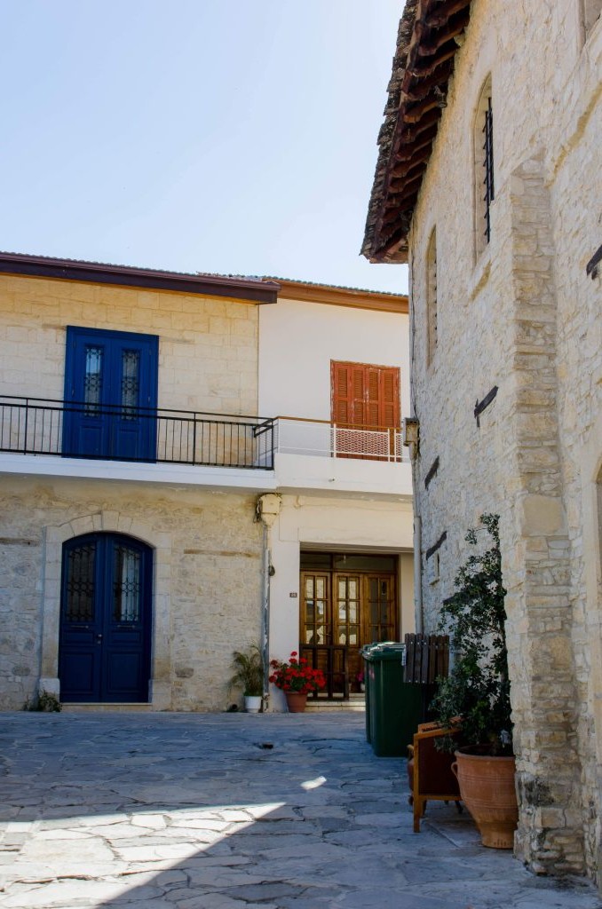 Historic balconies and colourful shutters in Omodos village.